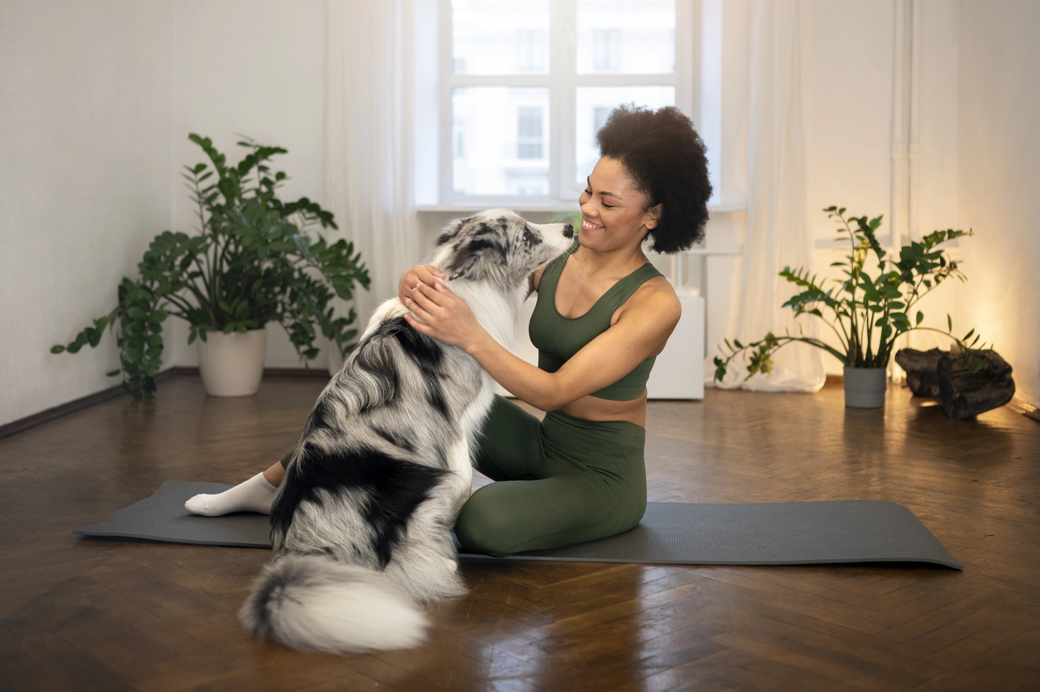 Ines Facius - Reiki - Lebensberatung -  Reiki Behandlungen auch für Tiere. Bild eines Hundes mit seiner Besitzerin